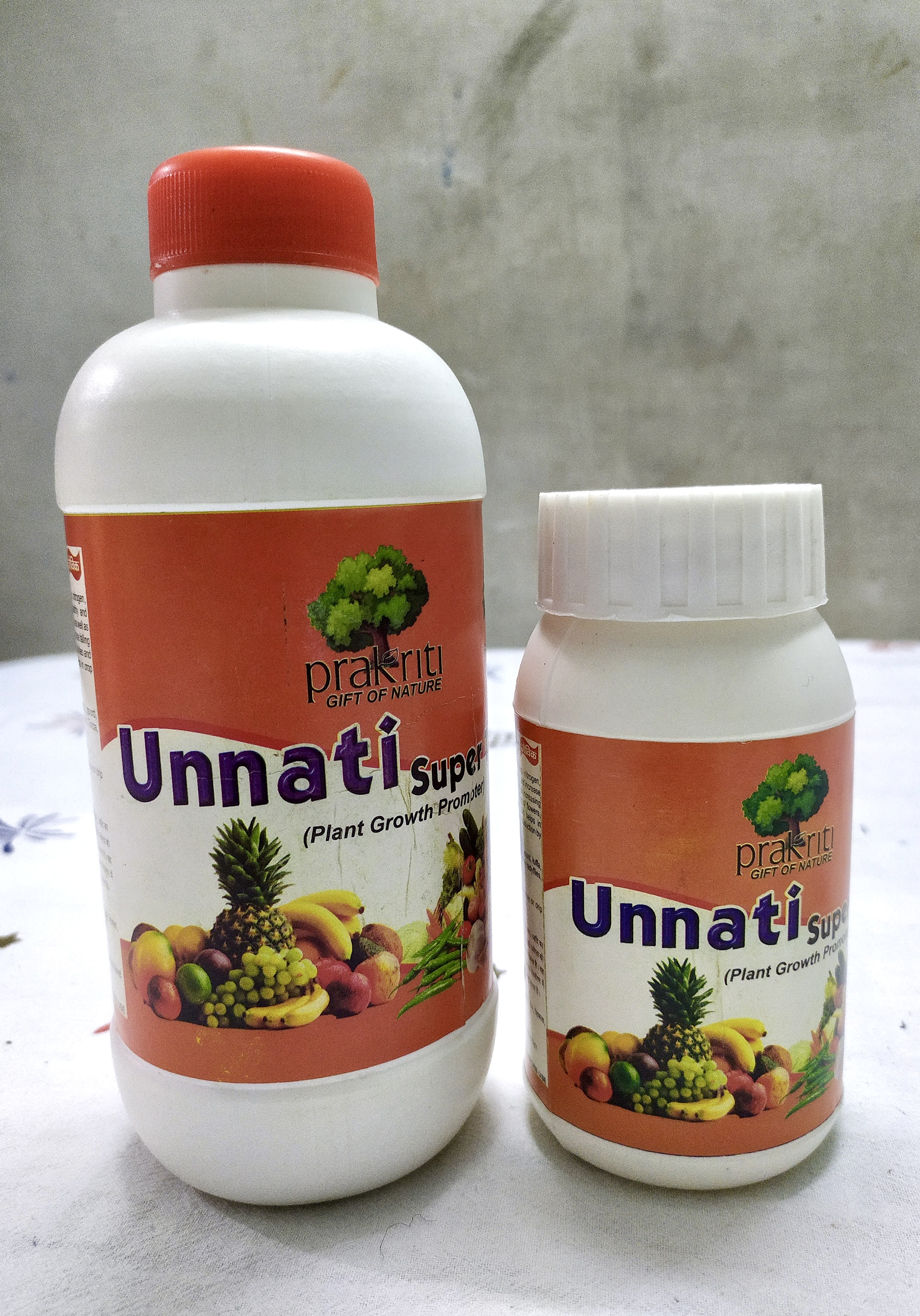 Unnati labels on two bottle sizes